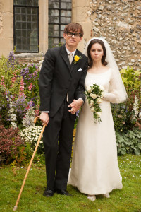 (l-r.) The wedding day arrives for Stephen Hawking (Eddie Redmayne) and Jane Wilde (Felicity Jones) in James Marsh’s romantic drama THE THEORY OF EVERYTHING, a Focus Features release. Photo Credit: Liam Daniel/Focus Features