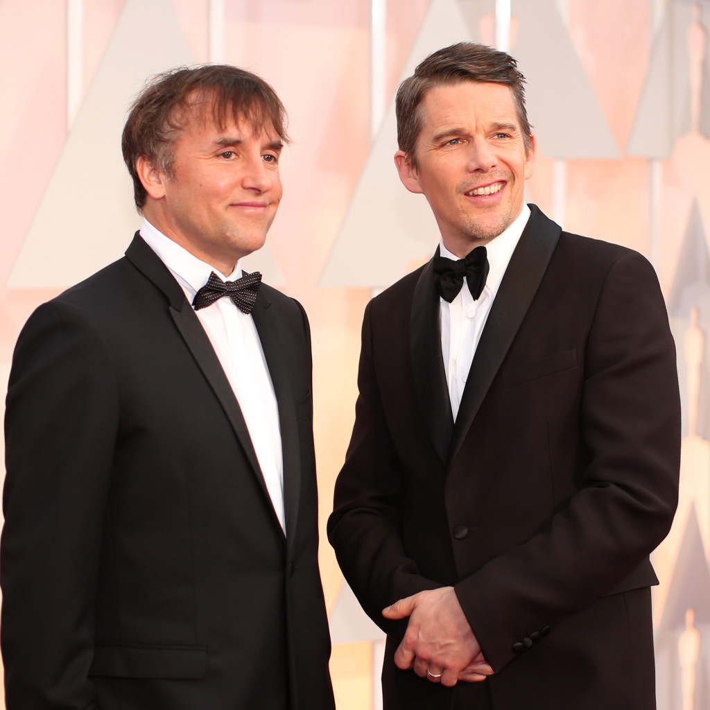 Director Richard Linklater (L) and actor Ethan Hawke attend the 87th Annual Academy Awards at Hollywood & Highland Center on February 22, 2015 in Hollywood, California. (Photo by Christopher Polk/Getty Images)