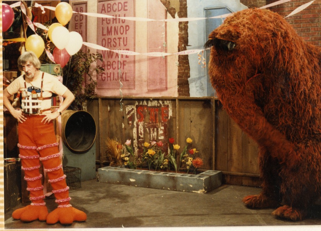 Archival photo of Caroll Spinney and Snuffleupagus (back when he was just imaginary) on the set of Sesame Street. Photo courtesy of Debra Spinney.