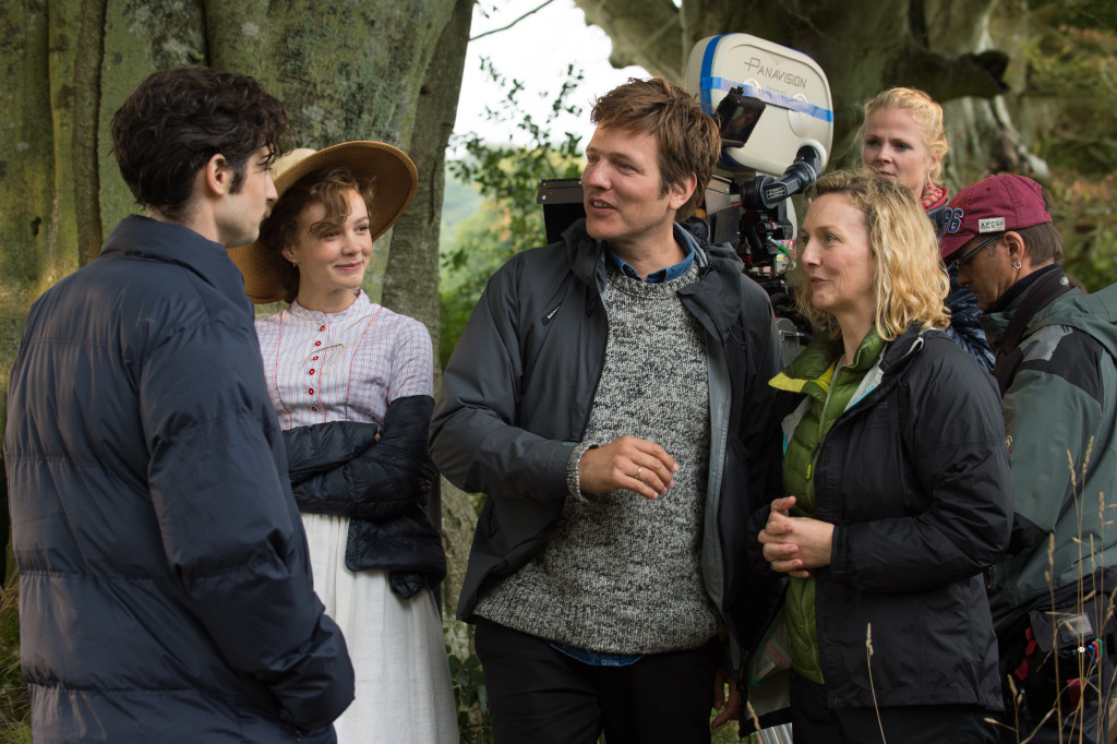 Carey Mulligan and Director Thomas Vinterberg on the set of "Far From The Madding Crowd." Photos by Alex Bailey. © 2014 Twentieth Century Fox Film Corporation All Rights Reserved.
