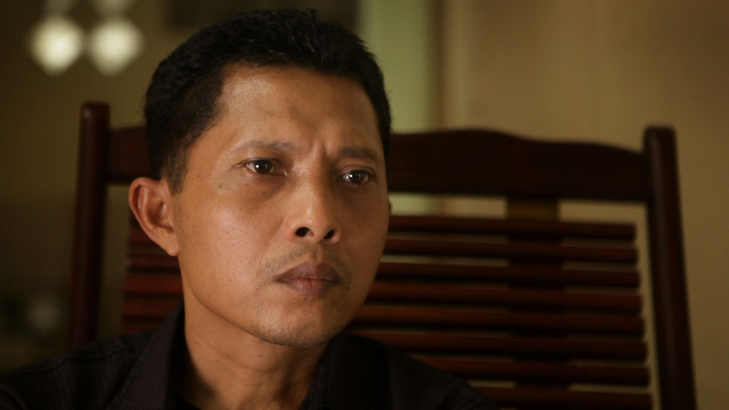 Adi, an optometrist who seeks to confront the death squad leaders responsible for his brother's death during the 1965 Indonesian genocides in Drafthouse Films' and Participant Media's "The Look of Silence." Courtesy of Drafthouse Films and Participant Media.