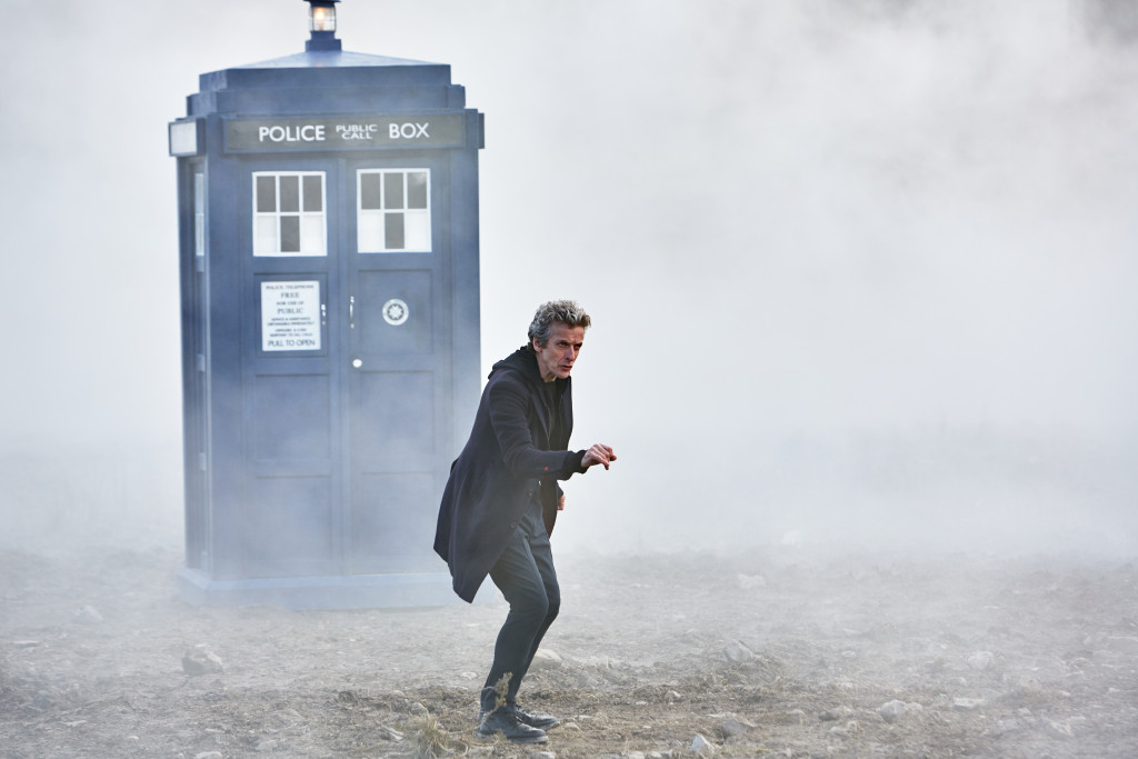 Peter Capaldi as Doctor Who with the aforementioned TARDIS in the background. Photo Credit: © BBC WORLDWIDE LIMITED