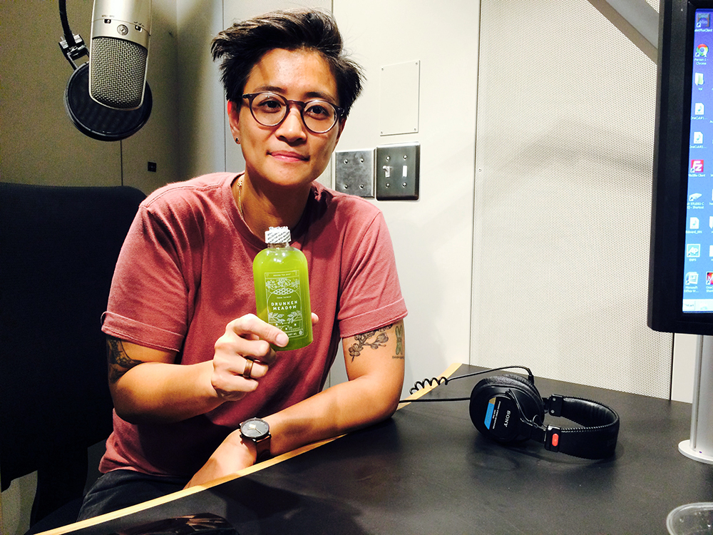 Furay Chang poses in the DPD New York Studio with a sample of Oocha tea.