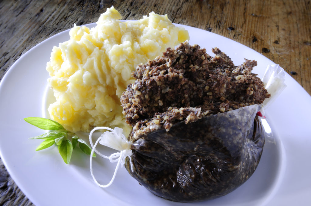 An actual plate of haggis (right) with a side of potatoes. (Photo Credit: Thinkstock)