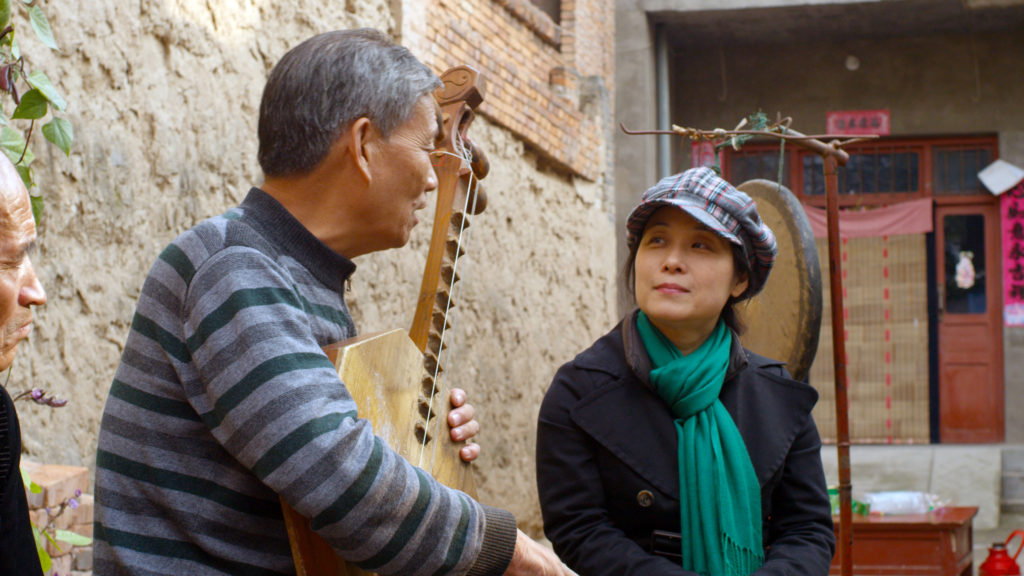 Wu Man of Silk Road Ensemble and Zhang Ximin in "The Music of Strangers." (Photo Courtesy of Participant Media)