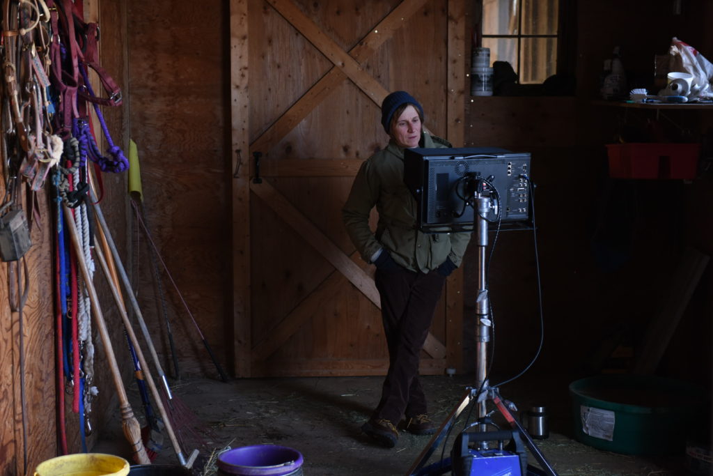 Kelly Reichardt on the set of "Certain Women." (Photo Credit: Jojo Whilden. Courtesy of IFC Films)