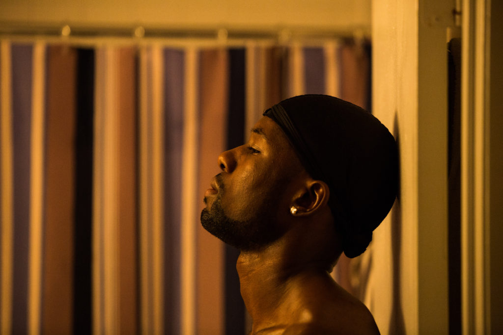 Trevante Rhodes as the adult Chiron. (Photo Credit: David Bornfriend, courtesy of A24) 