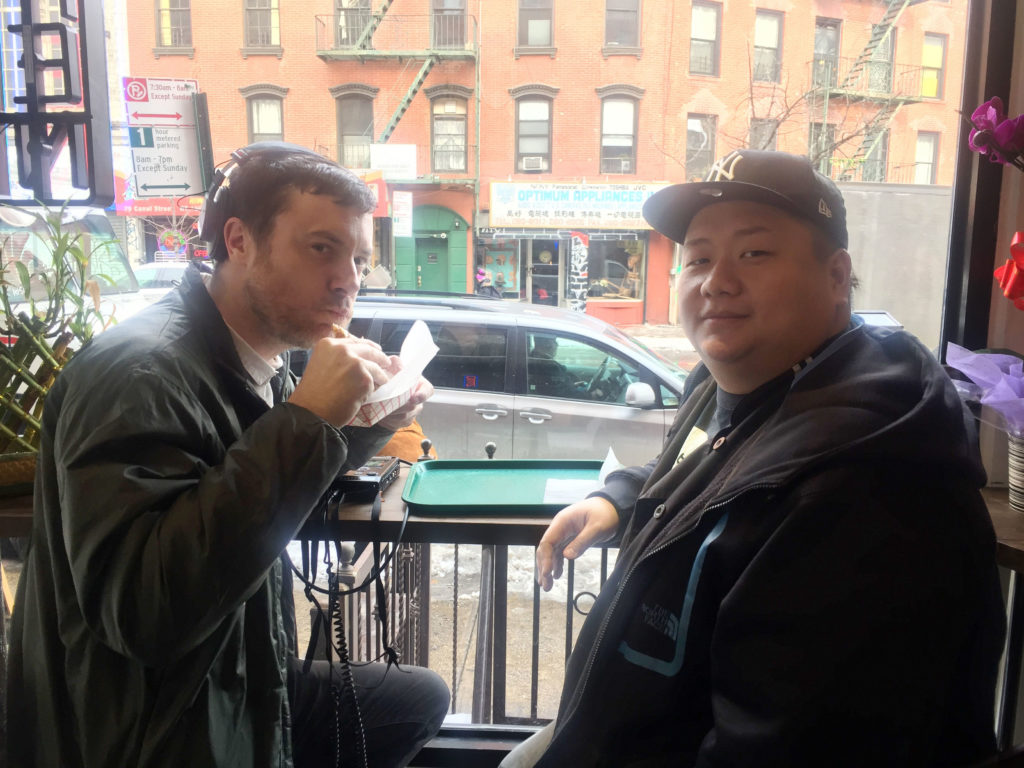 Brendan chowing down on with Johnny Shek.