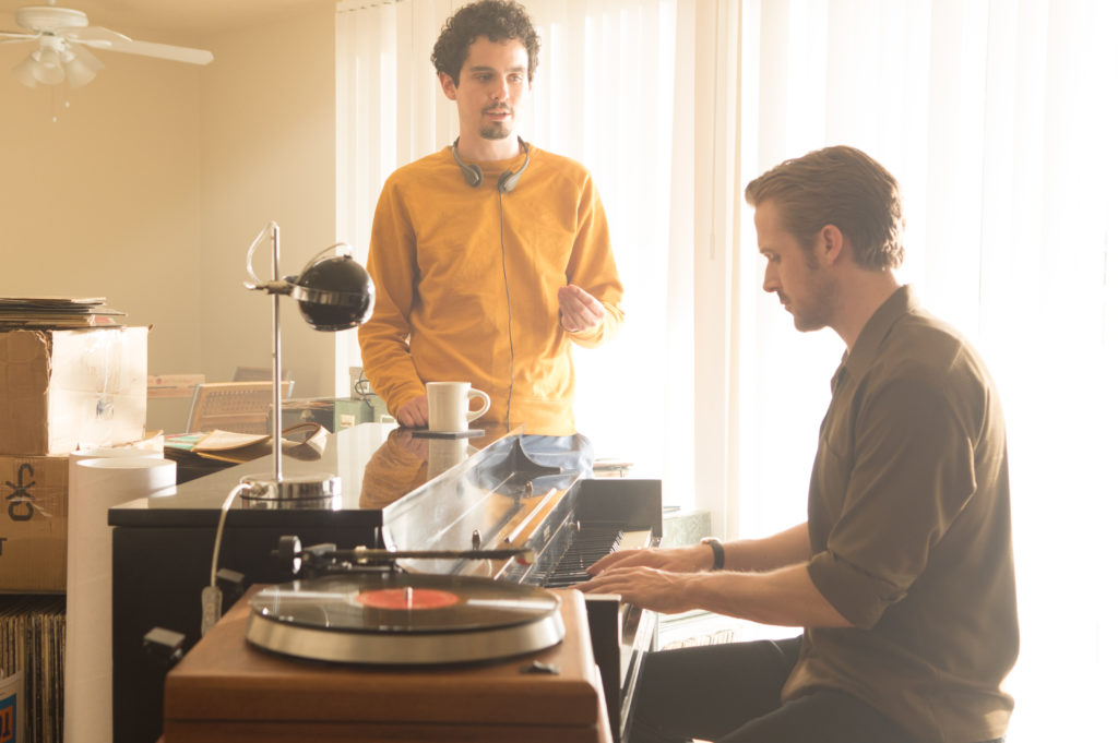 Director Damien Chazelle (left) and Ryan Gosling (right) on the set of LA LA LAND. Photo Credit: Dale Robinette