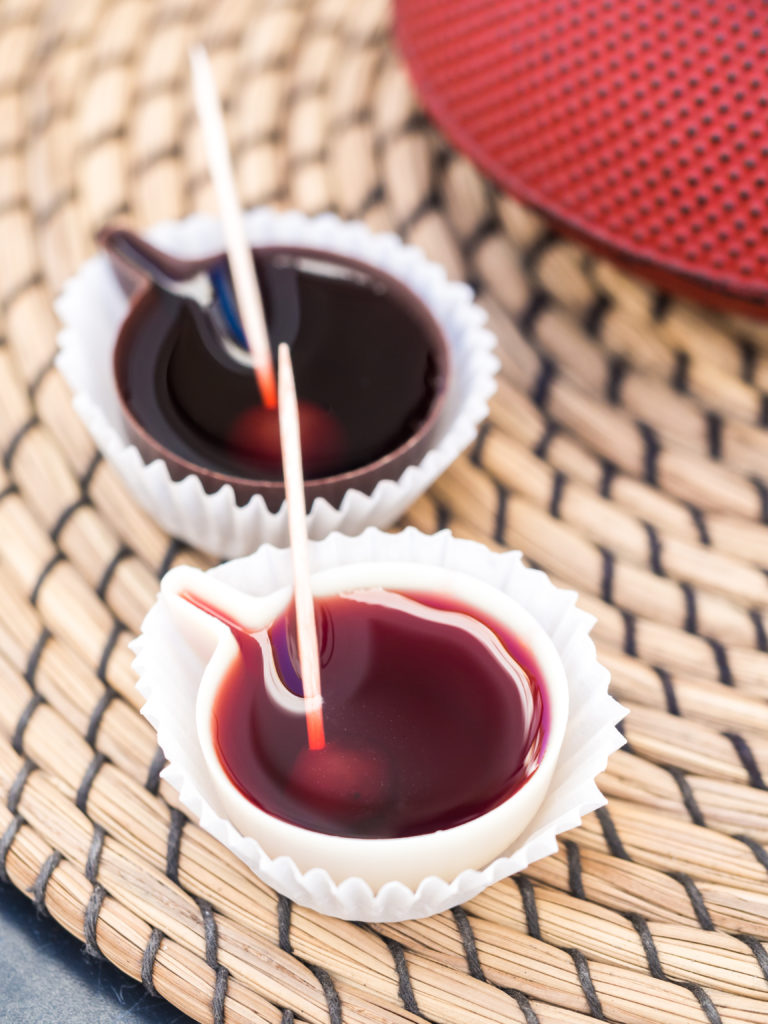 Ginja de Obidos, traditional sour cherry liquor, served in small cups made of chocolate. (Photo Credit: Sohadiszno / iStock / Getty Images Plus)